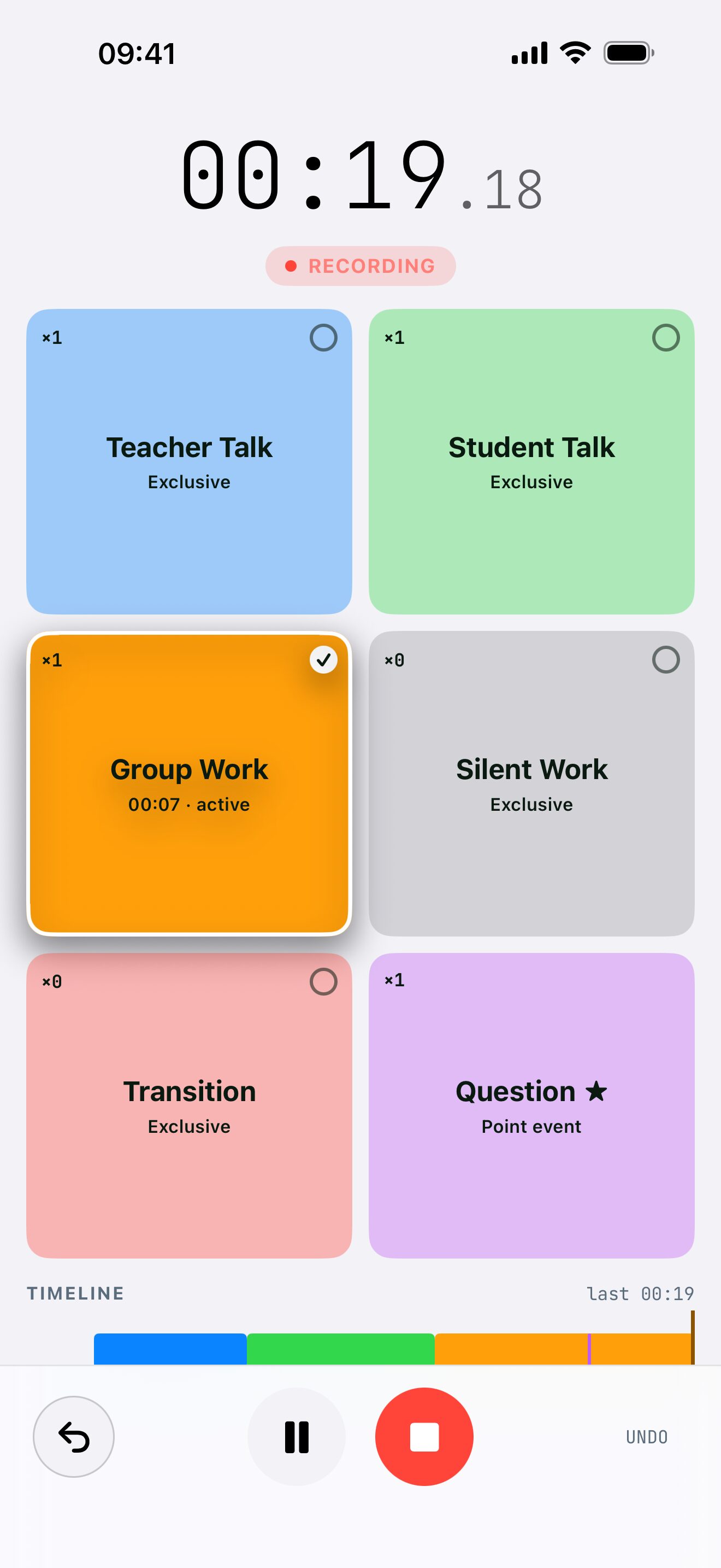 TimeMark recording a classroom observation: a running timer and a grid of buttons for teacher talk, student talk, group work, silent work, transitions and questions